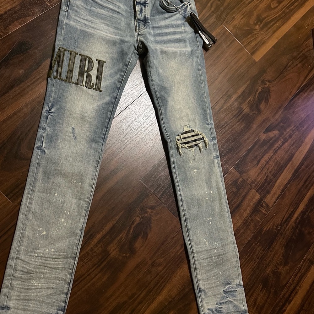 AMIRI Light Blue Distressed Jeans
